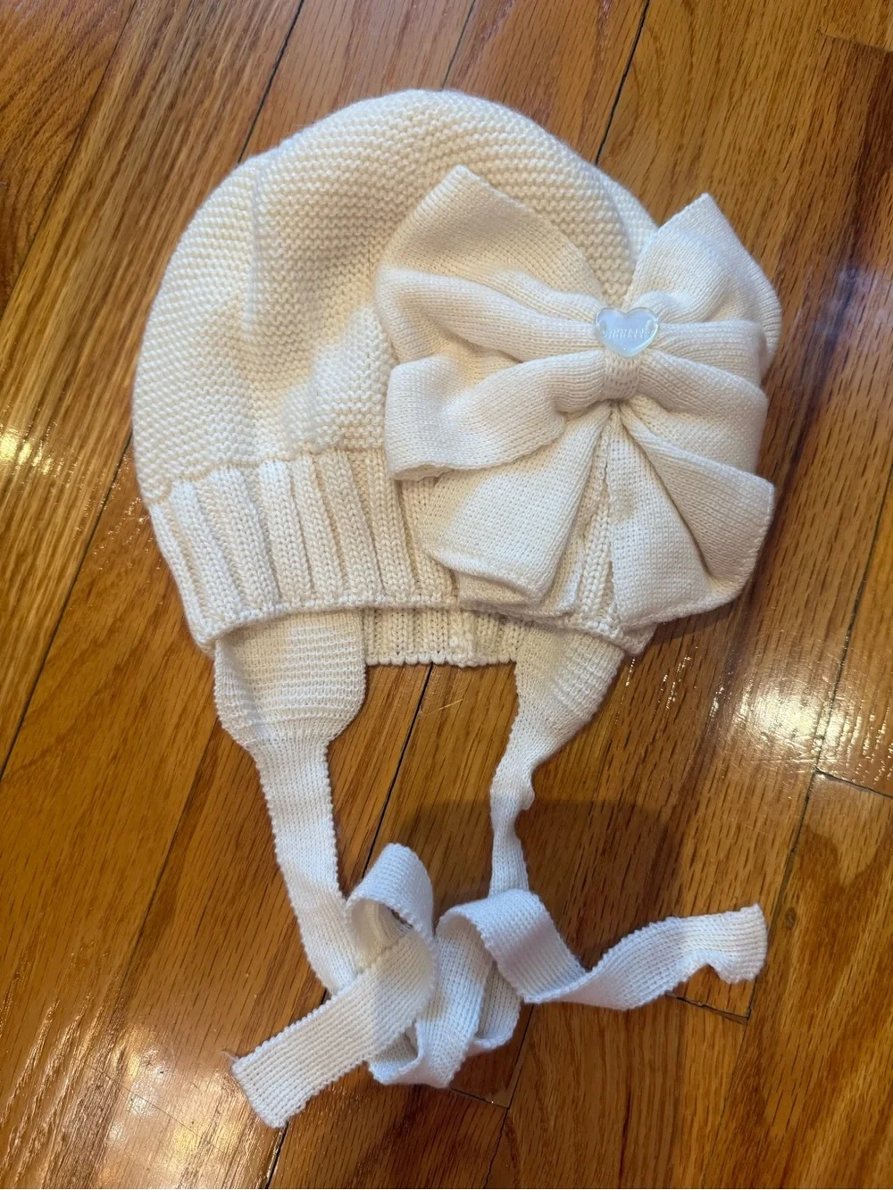 MonnaLisa Cream Knit Bow Baby Bonnet with Ties